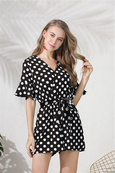 Γυναικεία ολόσωμη φόρμα πουά σε μαύρο και κόκκινο χρώμα