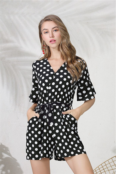 Γυναικεία ολόσωμη φόρμα πουά σε μαύρο και κόκκινο χρώμα