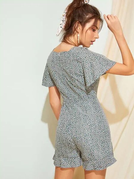 Salopetă modernă de damă cu decolteu în V și mâneci scurte