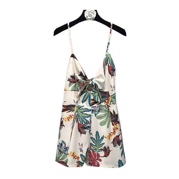 Salopetă scurtă de damă cu bretele subțiri de culoare albă cu model