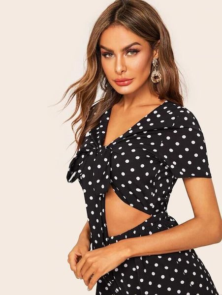 Γυναικεία ολόσωμη φόρμα πουά με κοντό μανίκι