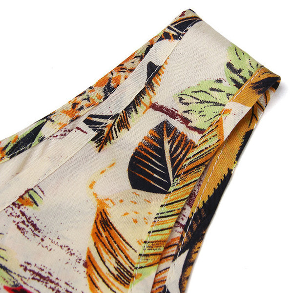 Rochie lungă de damă decupată cu motive florale în alb și bej