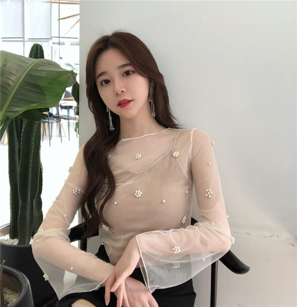 Bluză de damă actuală în două culori cu mâneci lungi