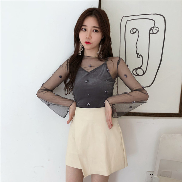 Bluză de damă actuală în două culori cu mâneci lungi