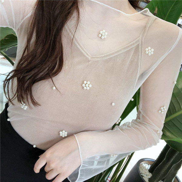 Bluză de damă actuală în două culori cu mâneci lungi