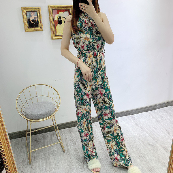 Salopetă lungă de damă, fără mâneci, cu model floral și cravată în talie