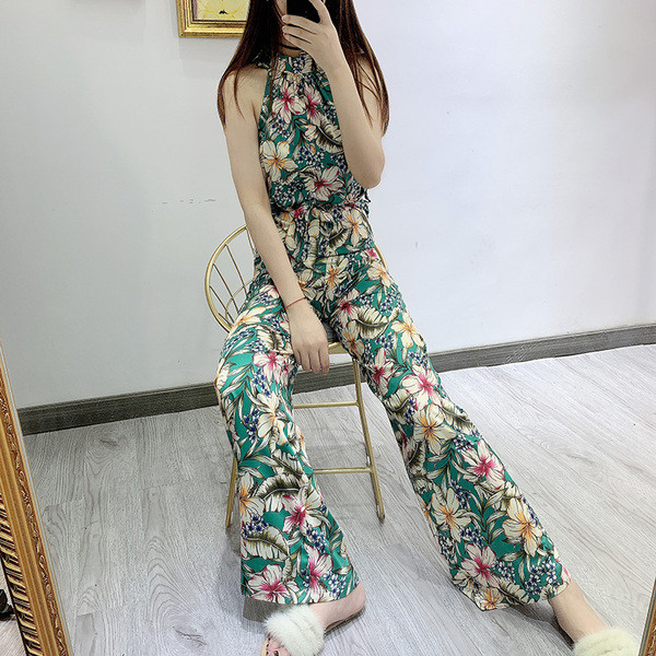 Salopetă lungă de damă, fără mâneci, cu model floral și cravată în talie