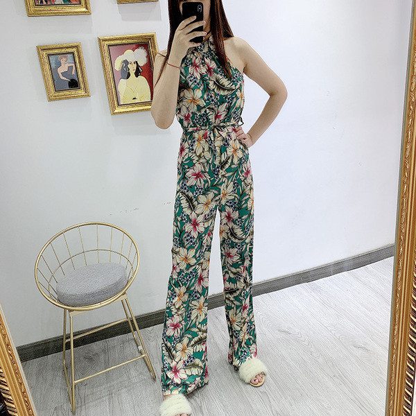 Salopetă lungă de damă, fără mâneci, cu model floral și cravată în talie