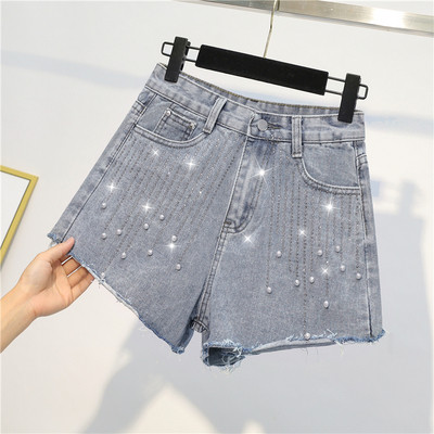 Blugi de dama moderni in albastru cu perle si pietre