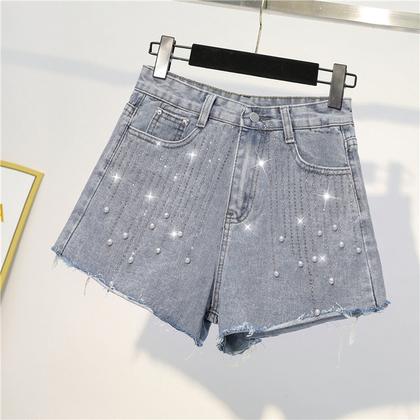 Blugi de dama moderni in albastru cu perle si pietre