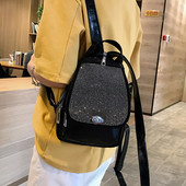 Rucsac modern de dama cu elemente metalice alb-negru