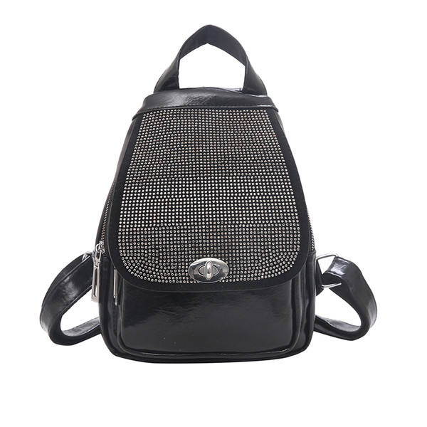 Rucsac modern de dama cu elemente metalice alb-negru