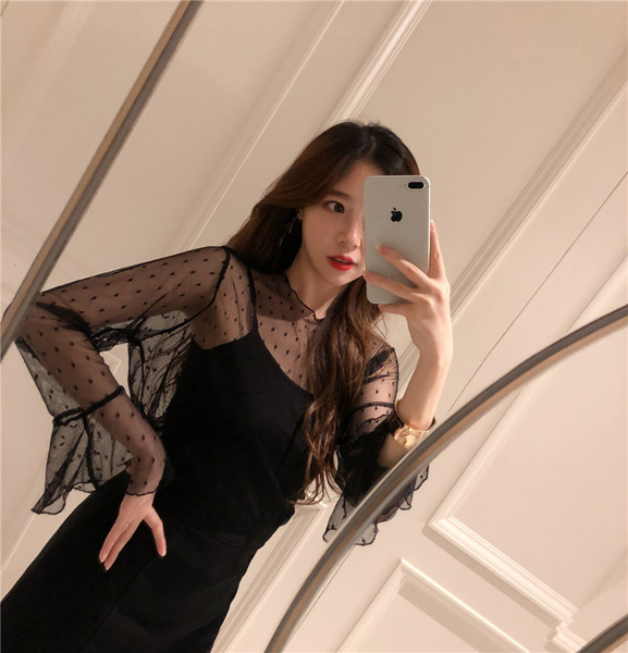 Bluză de damă modernă în negru cu puncte