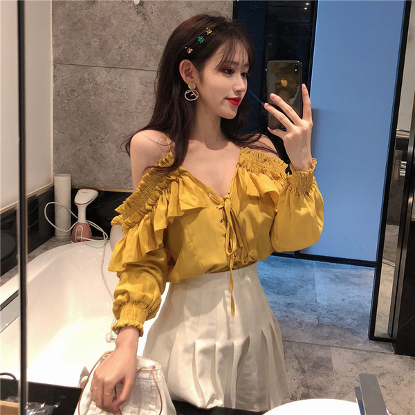 Bluză de damă modernă cu mâneci căzute în două culori