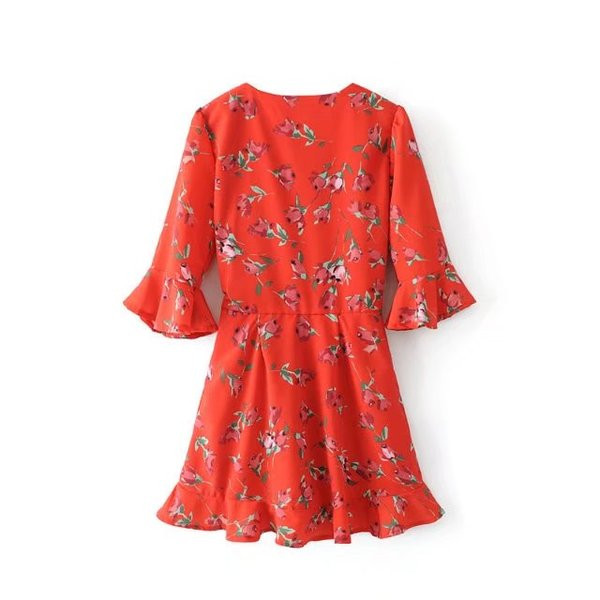 Salopetă cu decolteu adânc în V și mâneci lotus în roșu cu model