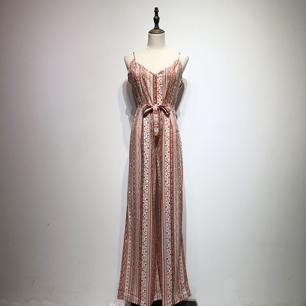 Salopetă de damă în dungi cu legături în talie și bretele subțiri