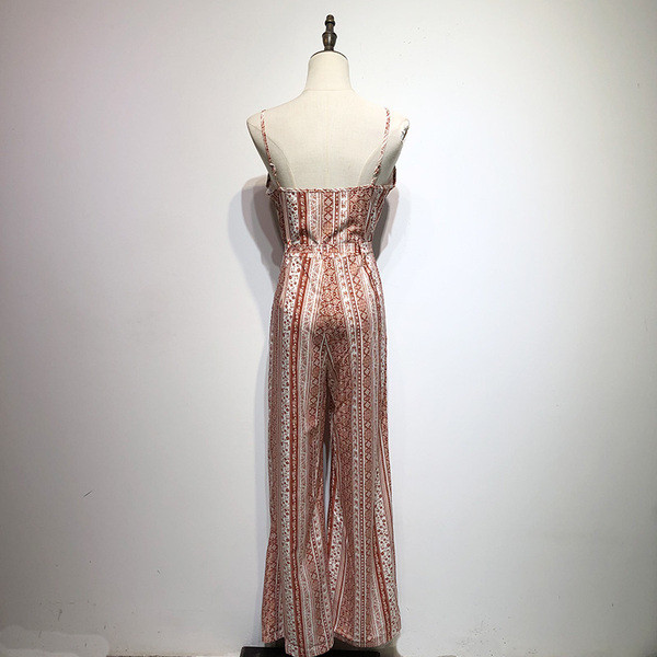 Salopetă de damă în dungi cu legături în talie și bretele subțiri