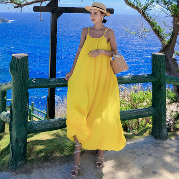 Rochie de damă modernă, decupată, de culoare galbenă, cu decolteu în V