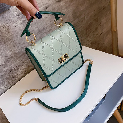 Geanta de dama cu inchidere metalica in patru culori