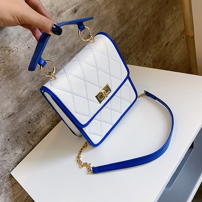 Geanta de dama cu inchidere metalica in patru culori