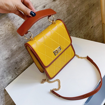 Geanta de dama cu inchidere metalica in patru culori