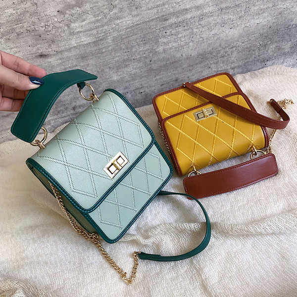 Geanta de dama cu inchidere metalica in patru culori