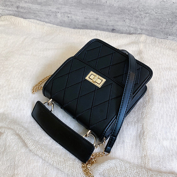 Geanta de dama cu inchidere metalica in patru culori