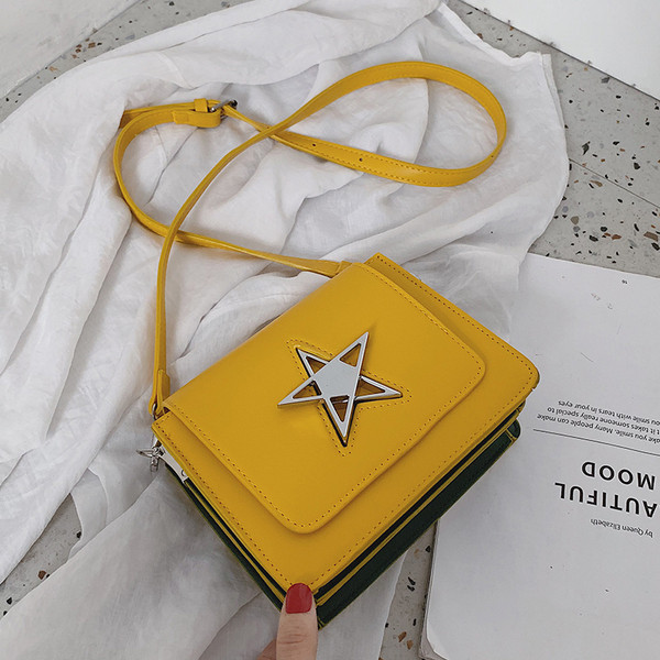 Geanta de dama moderna cu decor metalic in patru culori