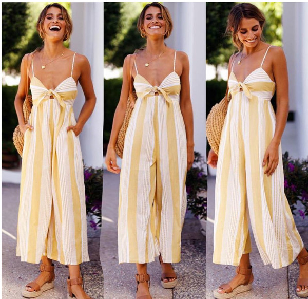 Model nou de salopeta dama in dungi cu bretele galbene