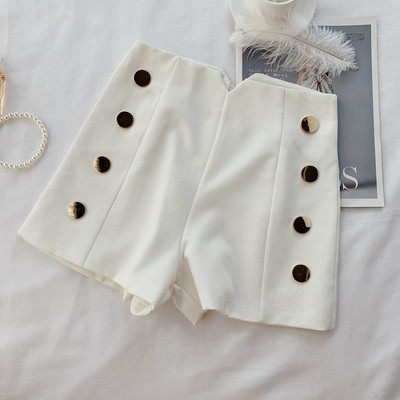 Pantaloni moderni de dama cu nasturi in alb si negru