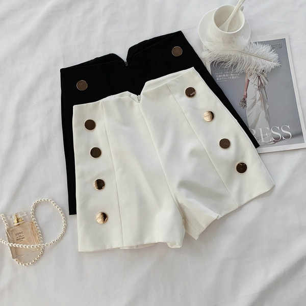 Pantaloni moderni de dama cu nasturi in alb si negru