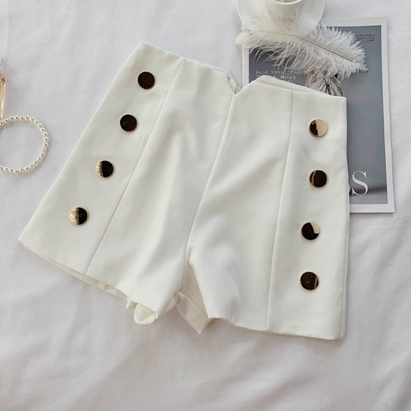 Pantaloni moderni de dama cu nasturi in alb si negru