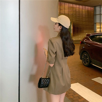 Rochie actuală de damă în maro și negru cu decolteu în V