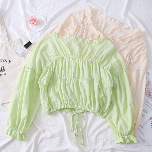 Bluză de damă elegantă cu decolteu în V în alb, roz și verde