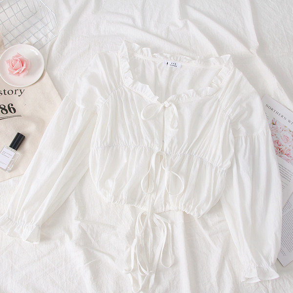 Bluză de damă elegantă cu decolteu în V în alb, roz și verde