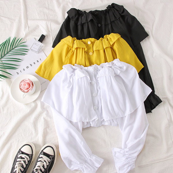 Bluză de damă elegantă cu umerii goi, în alb, negru și galben