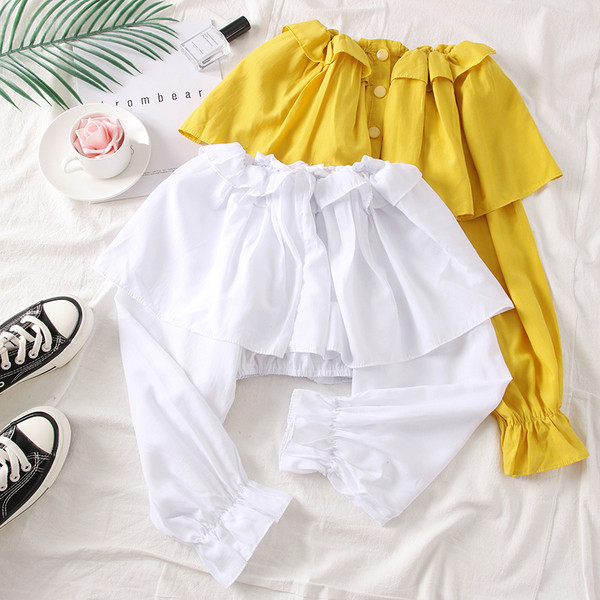 Bluză de damă elegantă cu umerii goi, în alb, negru și galben