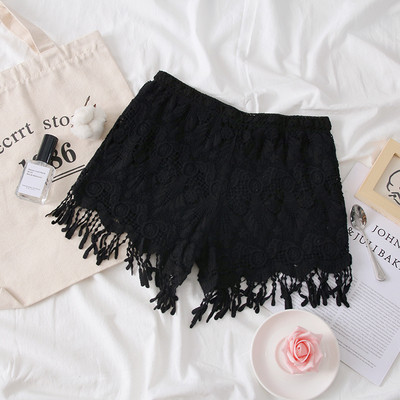 Pantaloni scurți moderni de damă în bej, alb și negru