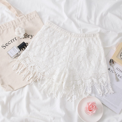 Pantaloni scurți moderni de damă în bej, alb și negru