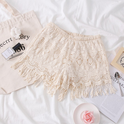 Pantaloni scurți moderni de damă în bej, alb și negru