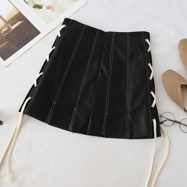 Fusta de dama moderna cu cravate in negru