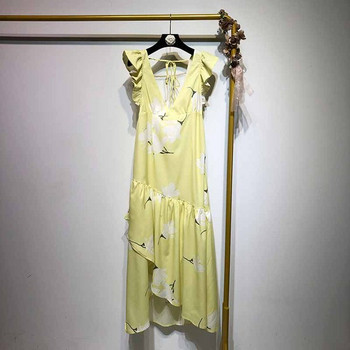 Rochie lungă cu mâneci lotus scurte și spate gol