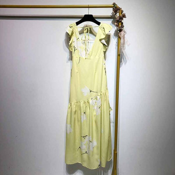 Rochie lungă cu mâneci lotus scurte și spate gol