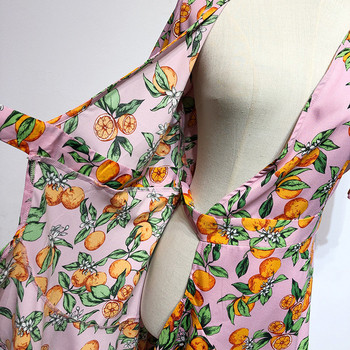 Rochie roz cu maneci scurte si cravate in talie cu model