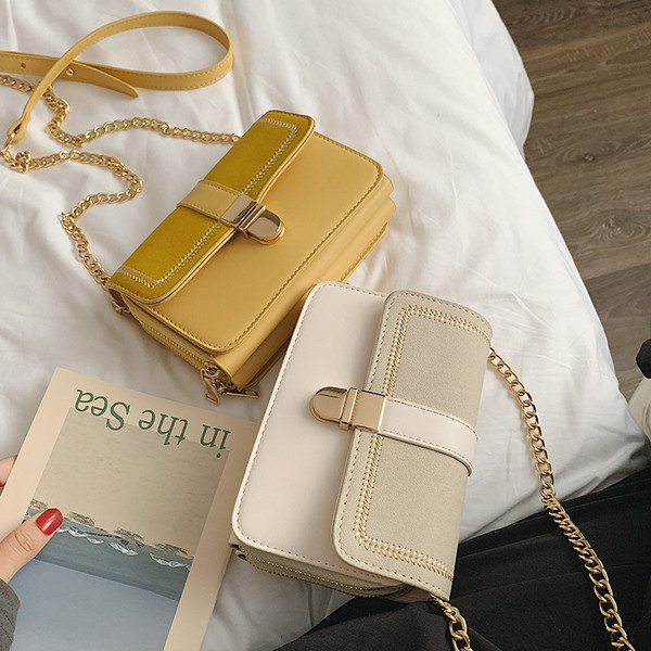 Geanta de dama moderna cu inchidere metalica in patru culori