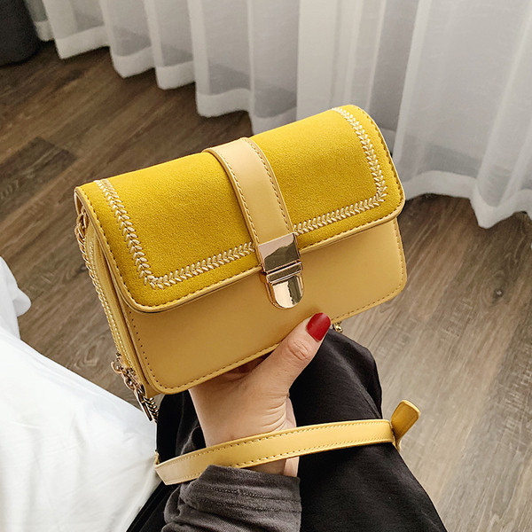 Geanta de dama moderna cu inchidere metalica in patru culori