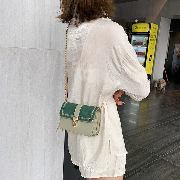 Geanta de dama moderna cu inchidere metalica in patru culori