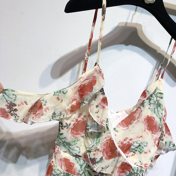 Rochie cu decolteu în V adânc și bretele cu model floral