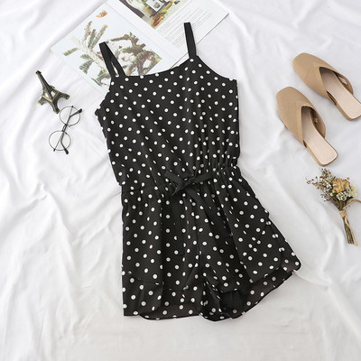 Alkalmi női overall vékony pánttal fekete színben, különböző mintákkal