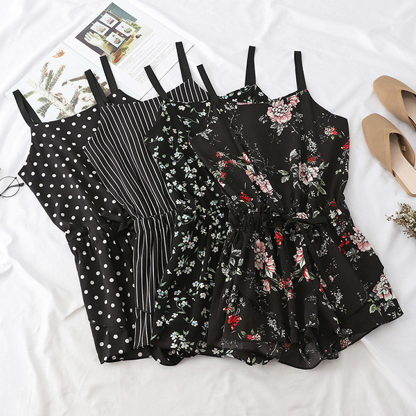 Alkalmi női overall vékony pánttal fekete színben, különböző mintákkal